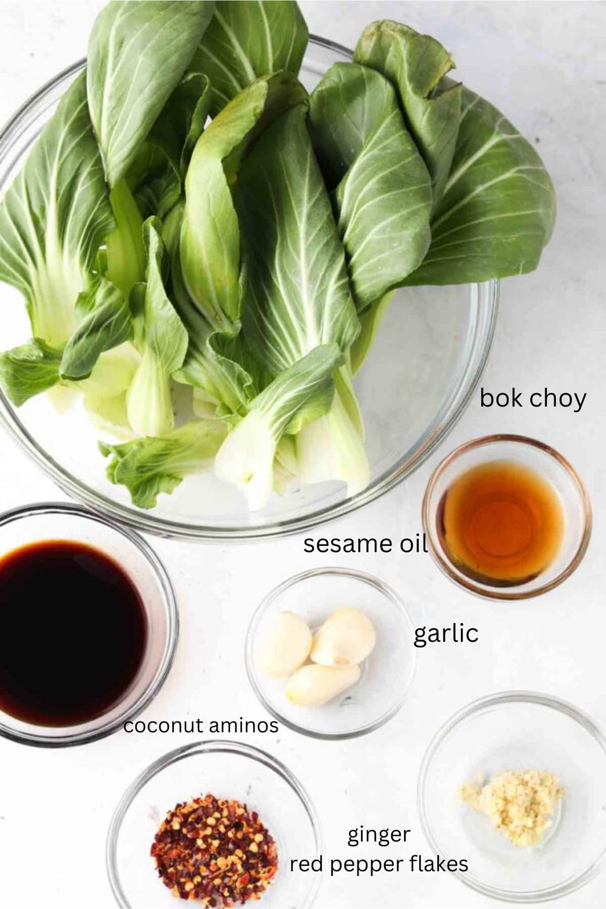 Roasted bok choy ingredients in small glass bowls. 