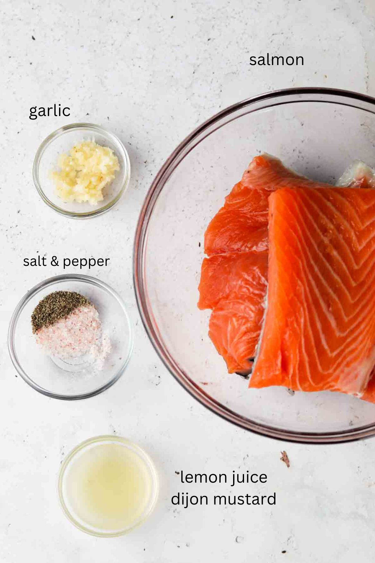 Recipe ingredient pictures in small glass clear bowls laying on the counter. 