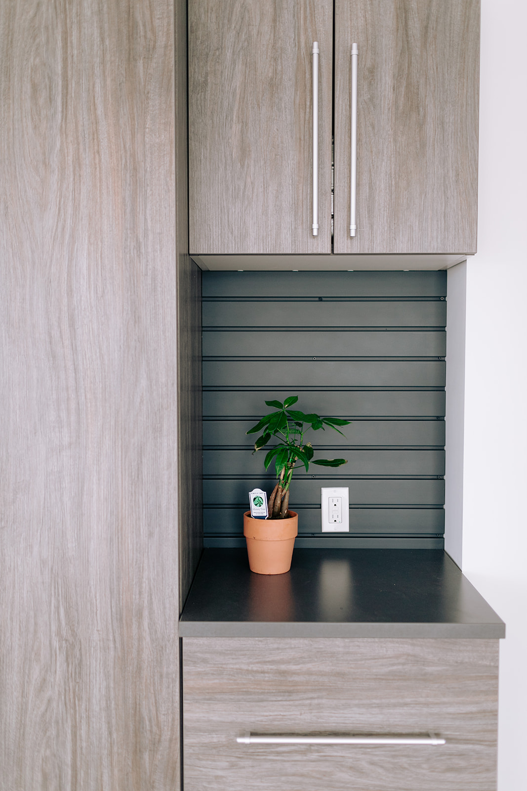 Inspired Closets working station in Allianna Moximchalks garage. 