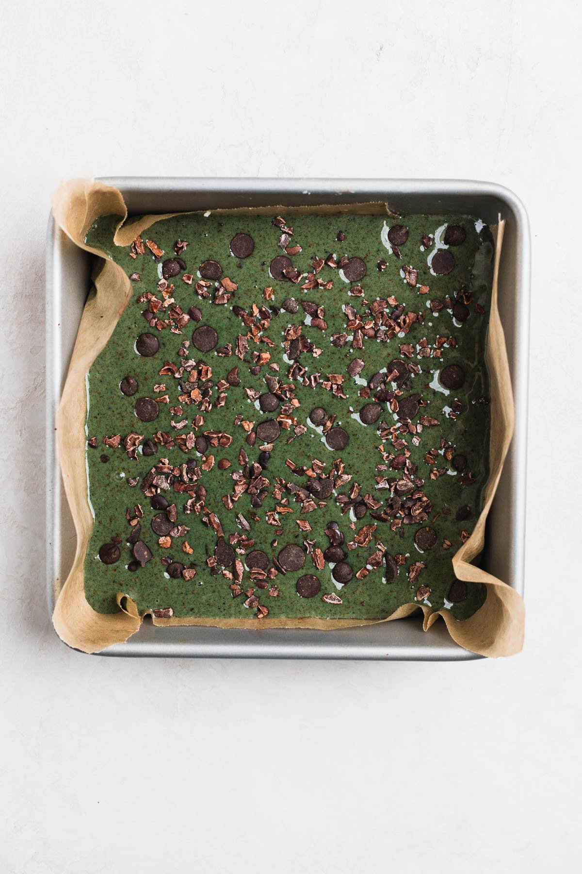 Mint vegan mixture in a baking pan.