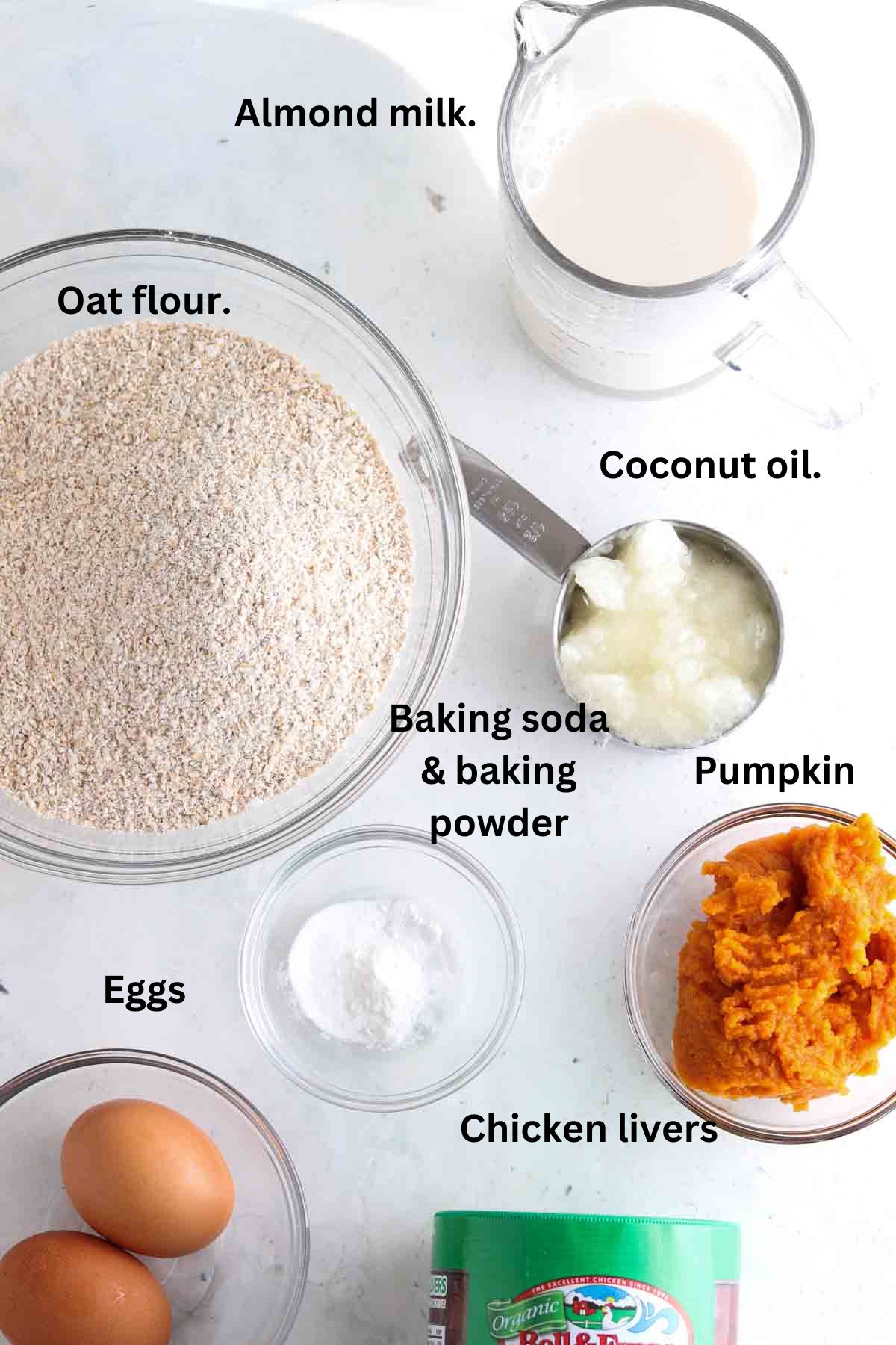 Dog liver cake ingredients laid out on the counter in glass bowls. 