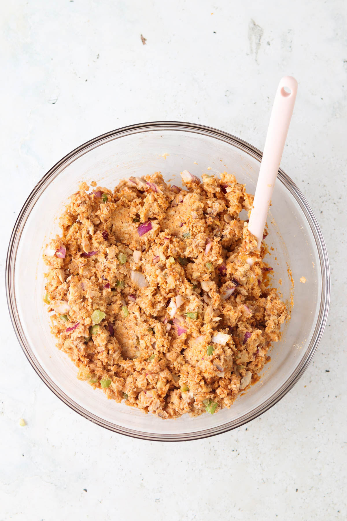 Salmon mixture mixed together in a large bowl.
