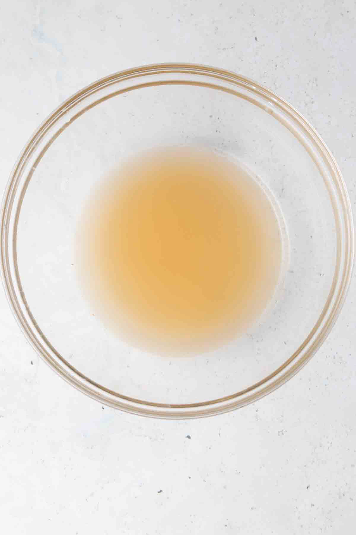 Grapefruit juice and club soda in a glass bowl.