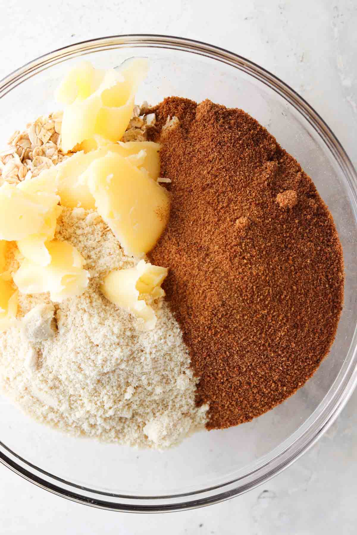 Crisp topping mixture in a glass bowl.