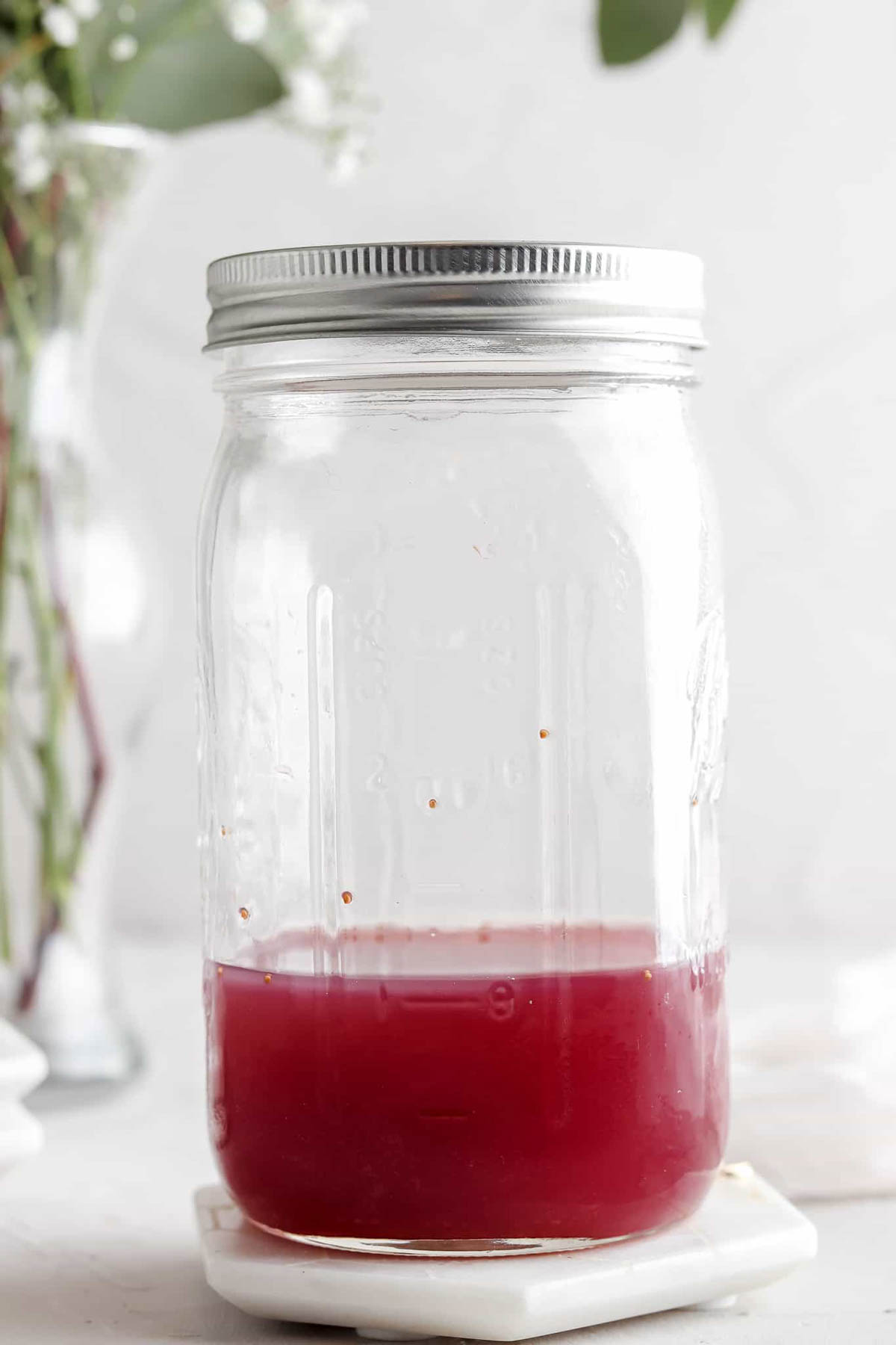 Fig simple syrup in a mason jar.