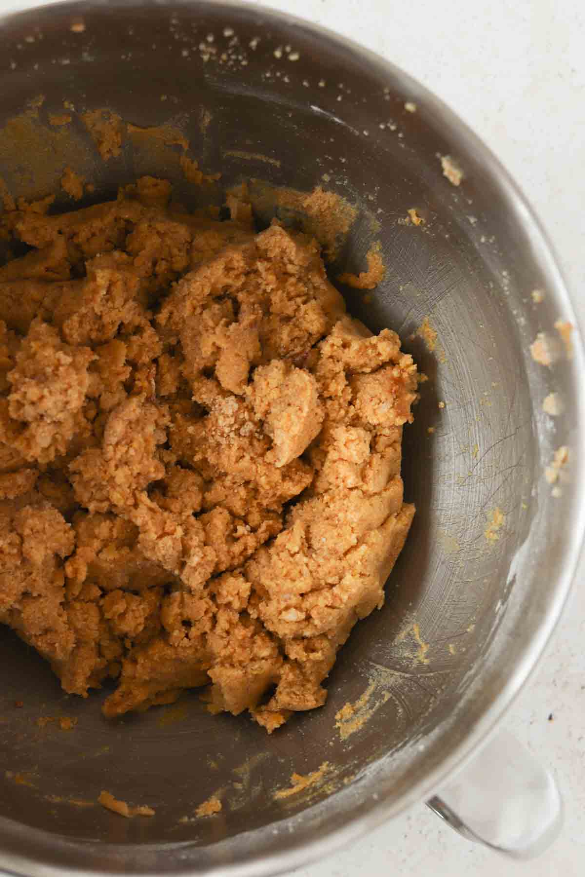 Well mixed cookie dough in a large bowl.