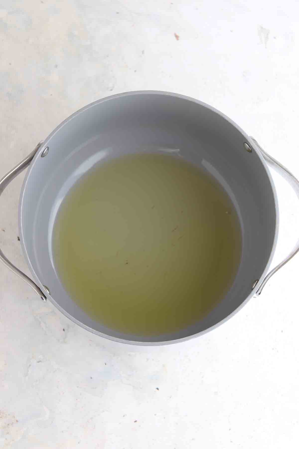 Melted butter in a dutch oven.