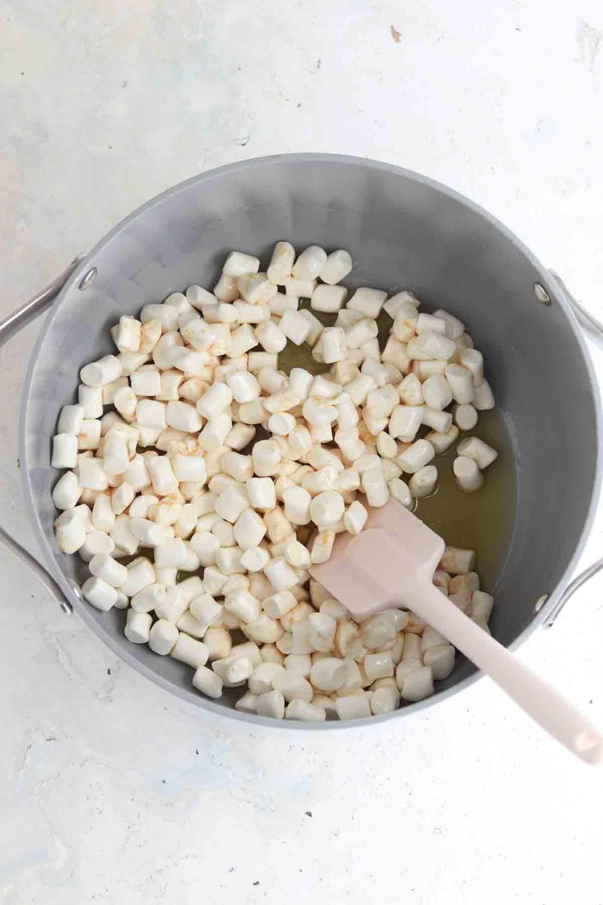 Melted butter and marshmallows in a dutch oven.