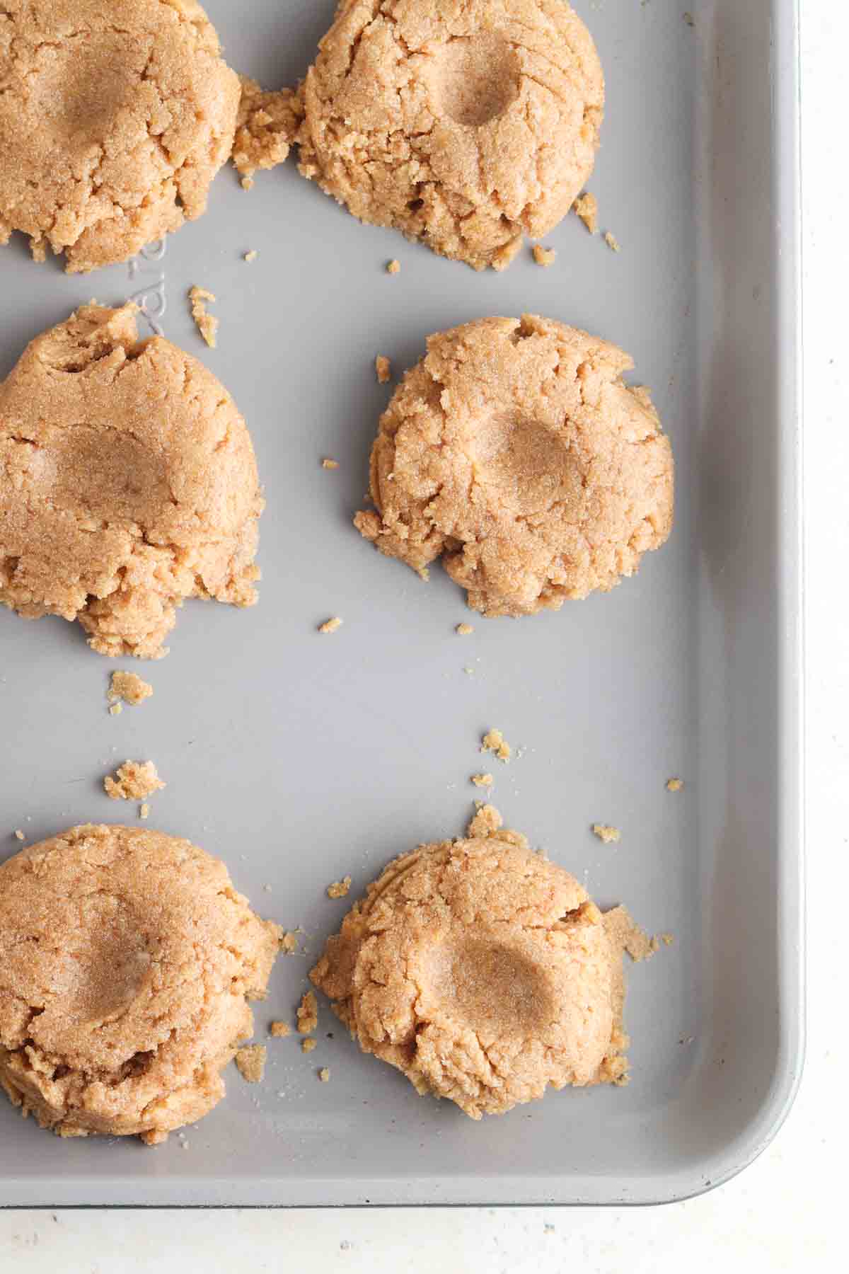 Cookies laid out on a cookie sheet. 
