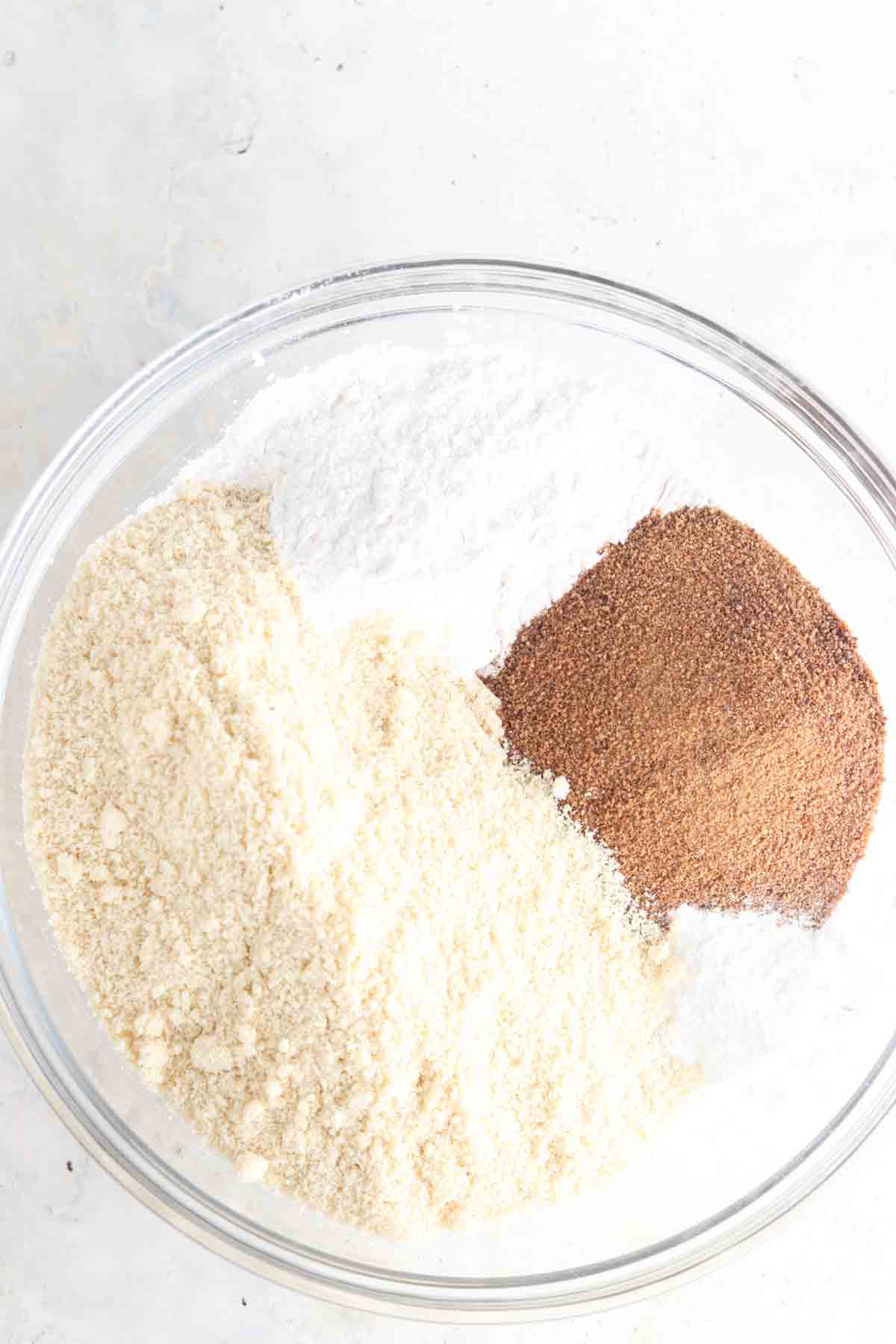 Banana cake dry ingredients in a large glass bowl 